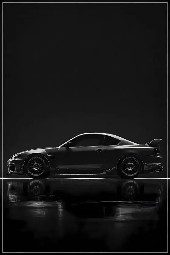 A black and white studio side profile of a Nissan Silvia S15. The car is shown in full silhouette against a dark background, with its reflection clearly visible on the glossy floor below.